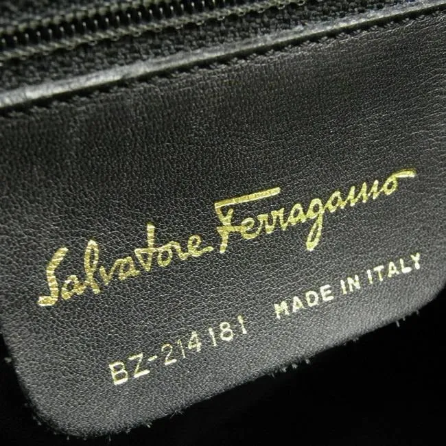 Amazing, Salvatore Ferragamo, RARE, olive green leather XL bucket bag or backpack with a gold Vara accent and a drawstring top closure