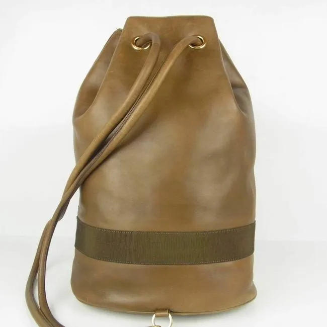 Amazing, Salvatore Ferragamo, RARE, olive green leather XL bucket bag or backpack with a gold Vara accent and a drawstring top closure