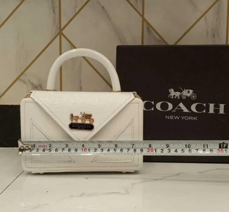 Coach Women's Handbag - Compact Size, Stylish Side Body (Beige/Peach)