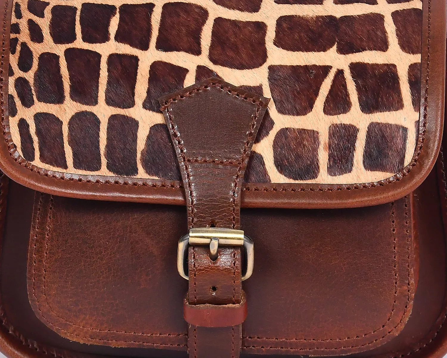 Elevate Your Style with our Printed Hair on Leather Sling Bag. Art: BG-1453